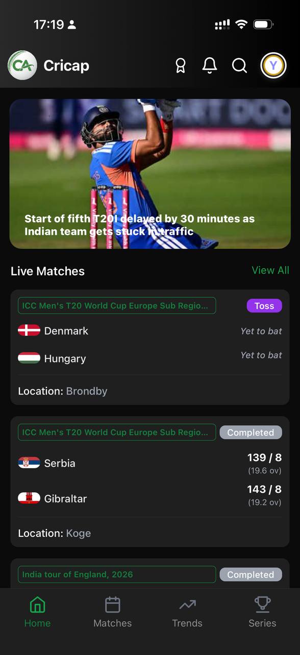 Cricap dark mode home screen with live matches